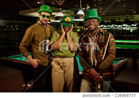 Friends in hats and shamrock eyeglasses Friends in hats and shamrock eyeglasses 116808737