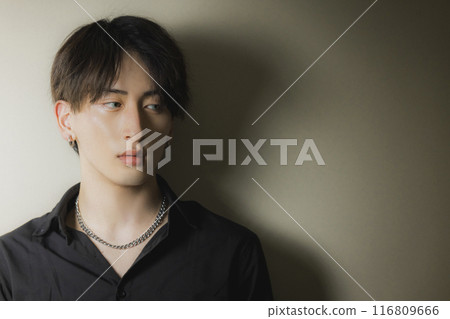 Man in black suit 116809666