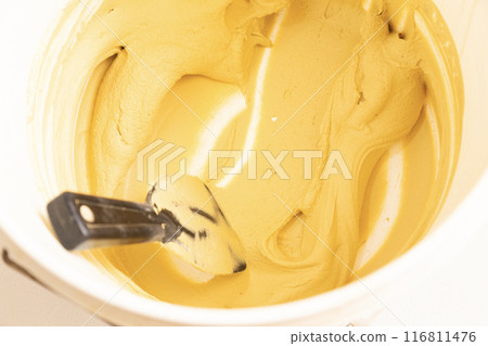 Interior construction: Bucket of putty Interior construction: Bucket of putty 116811476