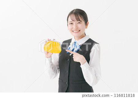 Woman in office clothes holding a wallet Woman in office clothes holding a wallet 116811818