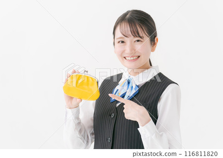 Woman in office clothes holding a wallet 116811820