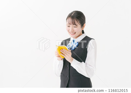 Woman in office clothes holding a wallet Woman in office clothes holding a wallet 116812015