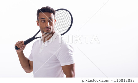 Young biracial man poses with a tennis racket on a white background, with copy space 116812882