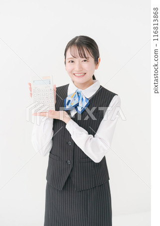 Woman in office clothes with a calculator 116813868