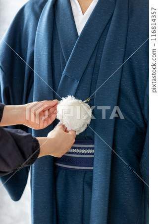 Close-up of a man wearing a kimono Close-up of a man wearing a kimono 116814357