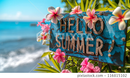 Beachside HELLO SUMMER sign on sandy beach with tropical flowers. Relaxed essence of summer by sea Beachside HELLO SUMMER sign on sandy beach with tropical flowers. Relaxed essence of summer by sea 116815102