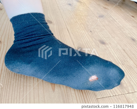 Old socks with holes Old socks with holes 116817948