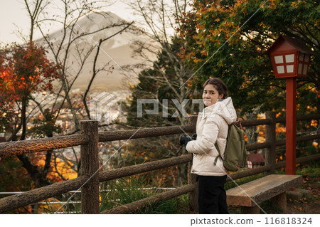 Woman tourist with mount Fuji at Chureito Pagoda in Autumn season, Traveler travel Arakurayama Sengen Park, Yamanashi, Japan. Landmark for tourist attraction. Japan Travel, Destination and Vacation Woman tourist with mount Fuji at Chureito Pagoda in Autumn season, Traveler travel Arakurayama Sengen Park, Yamanashi, Japan. Landmark for tourist attraction. Japan Travel, Destination and Vacation 116818324