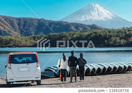 tourists enjoy with Fuji Mountain at Lake Saiko, happy friends group travel Mount Fuji and road trip Fuji Five Lakes. Landmark for tourists attraction. Japan Travel, Destination and Vacation concept tourists enjoy with Fuji Mountain at Lake Saiko, happy friends group travel Mount Fuji and road trip Fuji Five Lakes. Landmark for tourists attraction. Japan Travel, Destination and Vacation concept 116818738