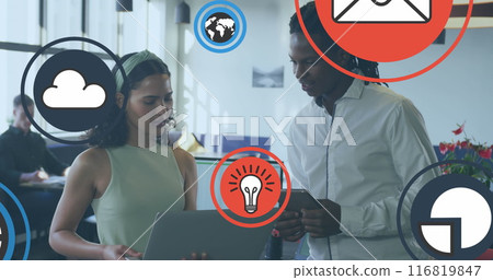 Image of icon in circles over diverse coworkers discussing reports on laptop in office Image of icon in circles over diverse coworkers discussing reports on laptop in office 116819847