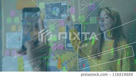 Image of graphs, numbers, diverse woman explaining reports and coworker recording in cellphone Image of graphs, numbers, diverse woman explaining reports and coworker recording in cellphone 116819889