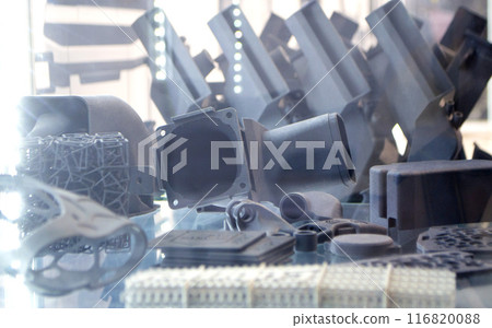 Different objects from powder plastic printed on 3D printer. Multi Jet Fusion MJF. Created model on industrial 3D printer from polyamide powder. Concept new modern innovation 3D printing technology 116820088