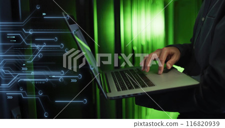 Image of motherboard over midsect5ion of biracial male it tech using laptop in server room 116820939