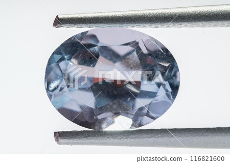 natural blue topaz gem on the isolated white background 116821600