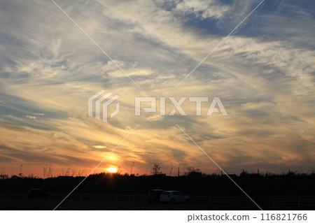 Clouds illuminated by the setting sun Clouds illuminated by the setting sun 116821766