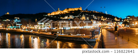 Tbilisi, Georgia. Panoramic Scenic View Of Impregnable Fortress Narikala Fortress, Metekhi Church. Night Boke Bokeh Blurred Ancient Fortress Narikala In Old Town Of Tbilisi. Caucasus. Abstract Blurred 116822641