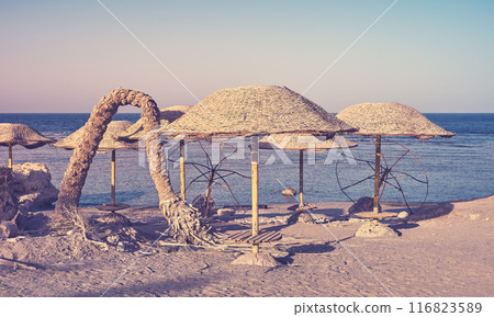Abandoned beach resort at sunset, color toning applied, Egypt. Abandoned beach resort at sunset, color toning applied, Egypt. 116823589