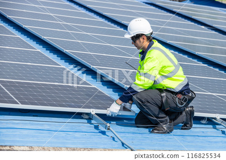 Professional Engineer Service Solar Panel. Worker Maintenance Cleaning Replacing Solar Panel. Solar photovoltaic panel system in Industry roof. Saving Energy with Clean Power. Professional Engineer Service Solar Panel. Worker Maintenance Cleaning Replacing Solar Panel. Solar photovoltaic panel system in Industry roof. Saving Energy with Clean Power. 116825534