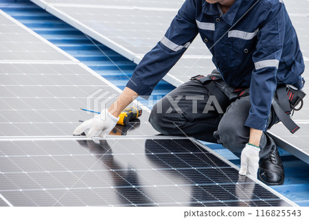 Professional Engineer Service Solar Panel. Worker Maintenance Cleaning Replacing Solar Panel. Solar photovoltaic panel system in Industry roof. Saving Energy with Clean Power. Professional Engineer Service Solar Panel. Worker Maintenance Cleaning Replacing Solar Panel. Solar photovoltaic panel system in Industry roof. Saving Energy with Clean Power. 116825543