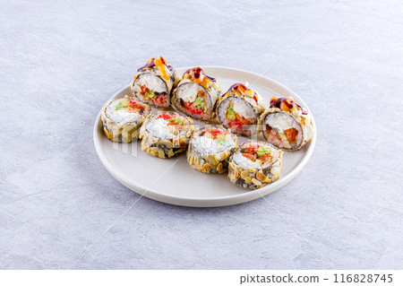 Japanese cuisine. Sushi roll on white background. 116828745