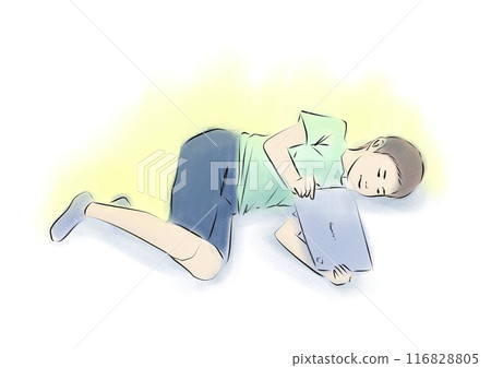 A boy lying down and watching a video 116828805