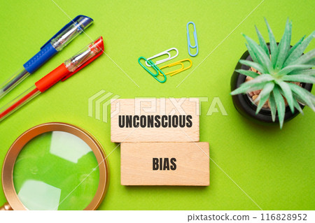 Unconscious bias concept - attitudes or stereotypes that affect our understanding, actions, and decisions in an unconscious manner. Implicit bias. Social norms or cultural influences. Wooden blocks Unconscious bias concept - attitudes or stereotypes that affect our understanding, actions, and decisions in an unconscious manner. Implicit bias. Social norms or cultural influences. Wooden blocks 116828952