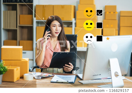 Happy Client customer experience concept. entrepreneur recording phone inquiry with checkboxes, smiling face rating excellent for satisfaction survey. 116829157