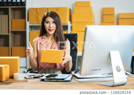 Successful Woman online seller. small business entrepreneur SME or Asian woman working freelance with online sell at home. 116829159