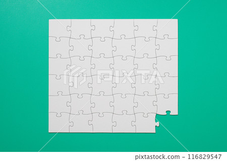 A jigsaw puzzle missing the last piece A jigsaw puzzle missing the last piece 116829547
