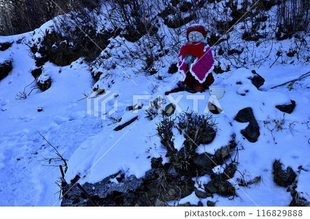 Jizo statue on the hiking trail in snowy mountains, Tanzawa Mountains, Sannotou Jizo Junction 116829888