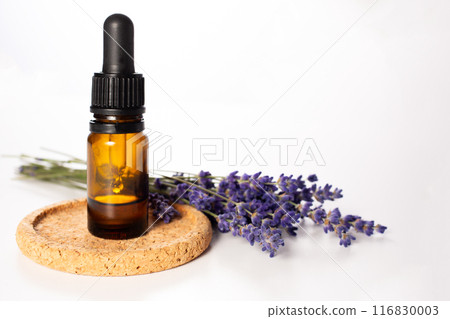 Fresh levander and flowers bottle of essential on the white background. Hair treatment concept. Close up.Copy space 116830003