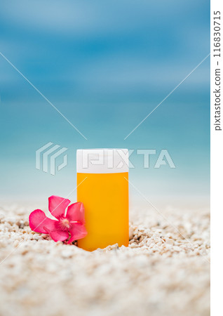 Sunscreen bottle on the beach 116830715