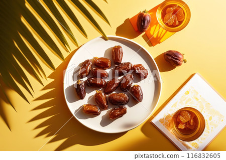 Vibrant and tasteful flatlay featuring succulent dates on a plate 116832605