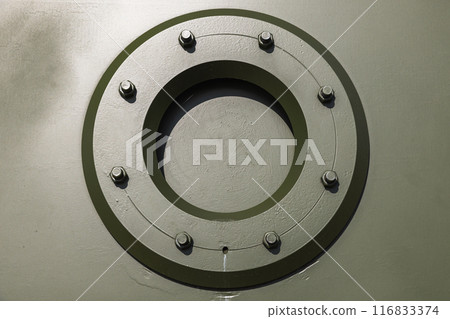 Military green background photo texture. Round frame 116833374