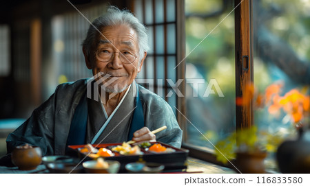 An old man eating a delivered lunch 116833580