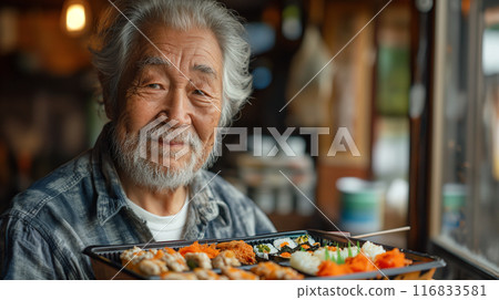 An old man eating a delivered lunch 116833581