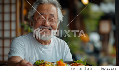 An old man eating a delivered lunch 116833583