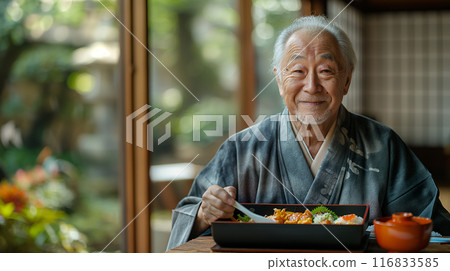 An old man eating a delivered lunch 116833585