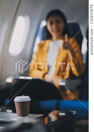 Female airplane passengers asian chinese people Entrepreneurs on Flight, Venturing Overseas Investments. Global Business Expansion, Foreign Markets, Strategic Financial Moves. Women in Business Suits Female airplane passengers asian chinese people Entrepreneurs on Flight, Venturing Overseas Investments. Global Business Expansion, Foreign Markets, Strategic Financial Moves. Women in Business Suits 116833676