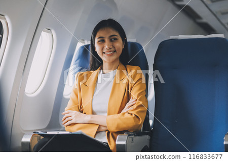 Female airplane passengers asian chinese people Entrepreneurs on Flight, Venturing Overseas Investments. Global Business Expansion, Foreign Markets, Strategic Financial Moves. Women in Business Suits 116833677