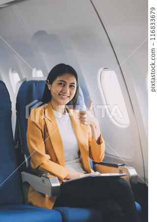 Female airplane passengers asian chinese people Entrepreneurs on Flight, Venturing Overseas Investments. Global Business Expansion, Foreign Markets, Strategic Financial Moves. Women in Business Suits 116833679