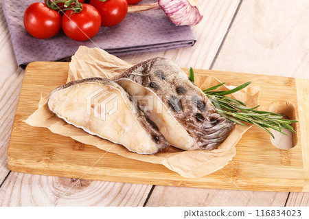 Raw wolffish steak for cooking 116834023