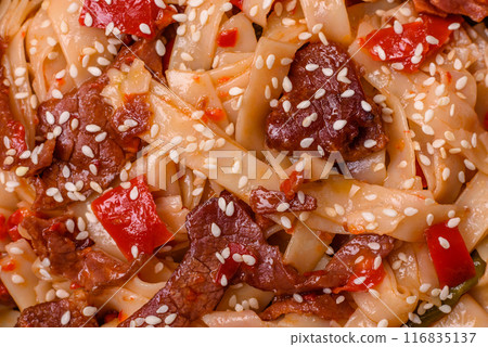 Delicious asian udon dish with vegetables, meat, salt and spices 116835137