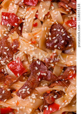 Delicious asian udon dish with vegetables, meat, salt and spices 116835138