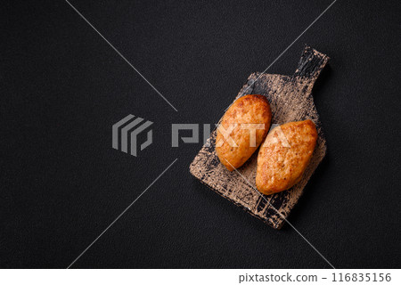 Delicious fresh fried minced fish cutlets with spices and herbs Delicious fresh fried minced fish cutlets with spices and herbs 116835156