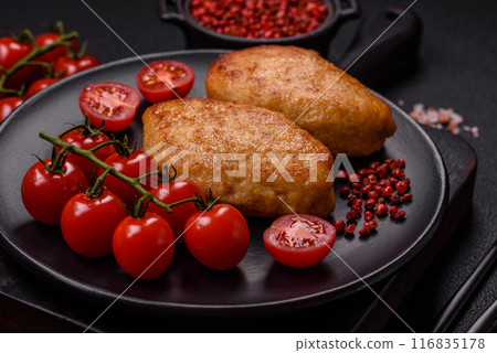 Delicious fresh fried minced fish cutlets with spices and herbs Delicious fresh fried minced fish cutlets with spices and herbs 116835178