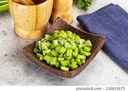 Vegan cuisine - Sliced celery stem Vegan cuisine - Sliced celery stem 116835675