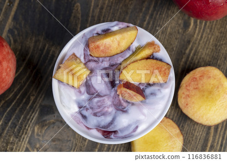 natural yogurt in a white bowl with fruits natural yogurt in a white bowl with fruits 116836881