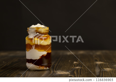 natural yogurt in a glass jar with fruits natural yogurt in a glass jar with fruits 116836903