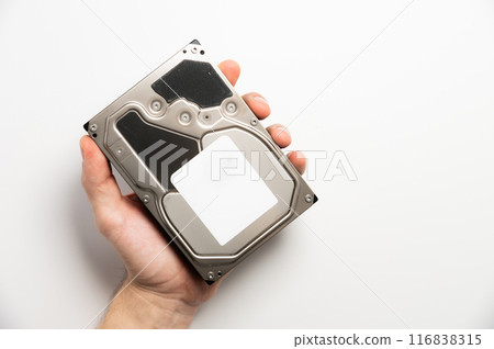 hard drive in a man's hand. Data repair and recovery concept 116838315
